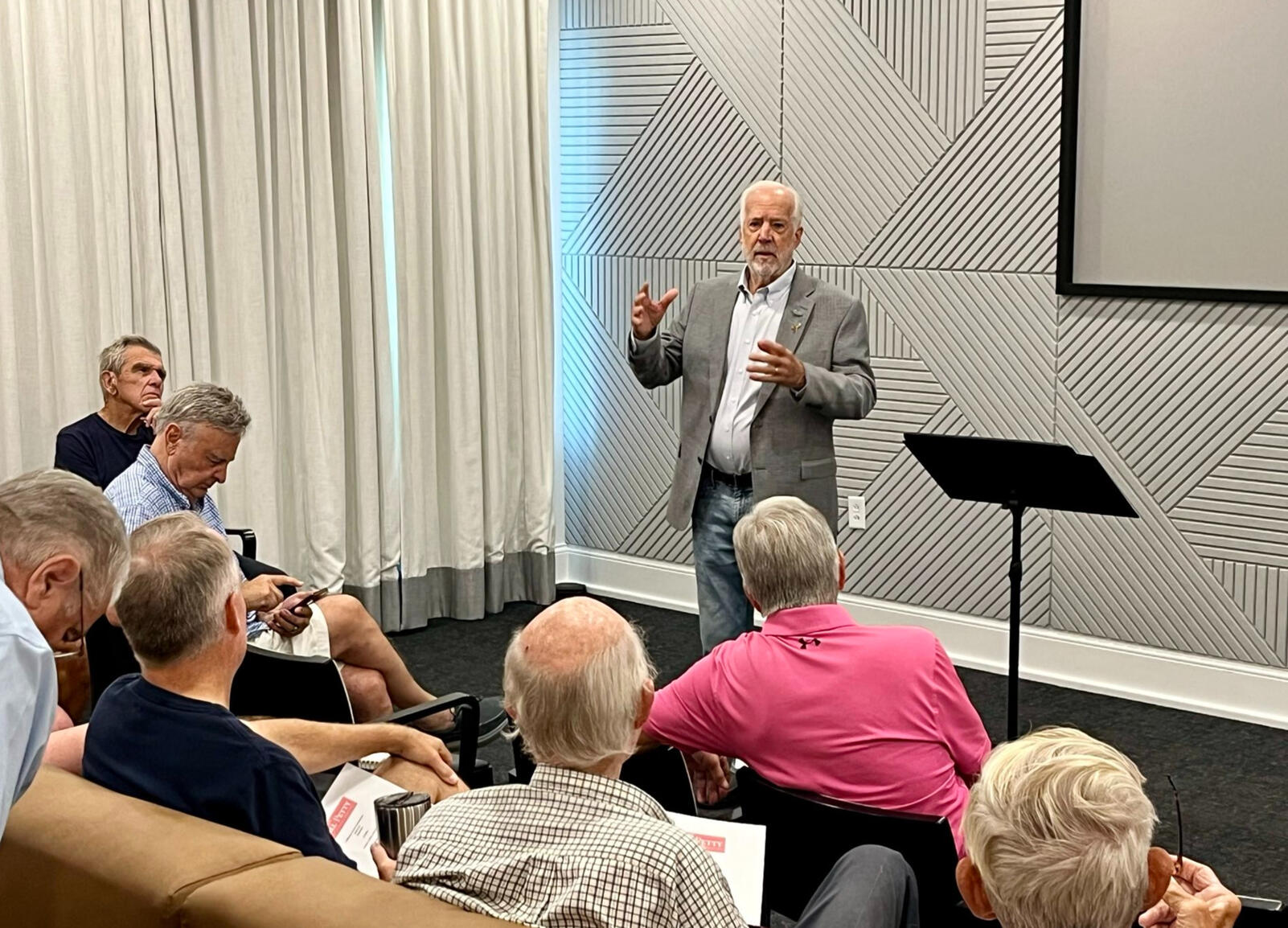 Bill speaks before a recent Men&#39;s Group meeting.